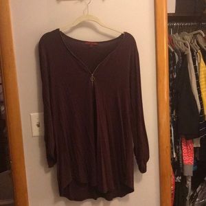 Mid sleeve Maroon shirt with zipper.